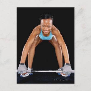 Jonge vrouw tilt barbel, portret briefkaart