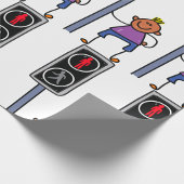 Jongen bij voetgangersoversteekplaats met rood sto cadeaupapier