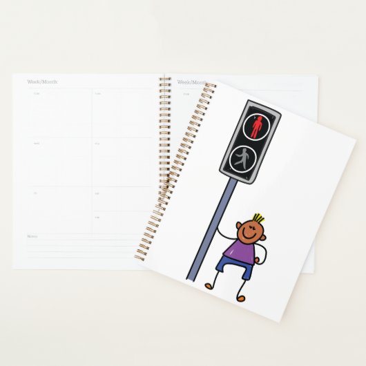 Jongen bij voetgangersoversteekplaats met rood sto planner (Display)