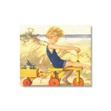 jongen die aan de strand met zandspeelgoed speelt