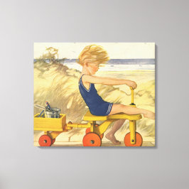  jongen die aan de strand met zandspeelgoed speelt canvas afdruk