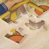 jongen die aan de strand met zandspeelgoed speelt legpuzzel (Zijkant)