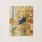 jongen die aan de strand met zandspeelgoed speelt legpuzzel (Verticaal)