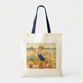  jongen die aan de strand met zandspeelgoed speelt tote bag (Voorkant)