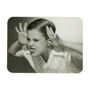 Jongen die gezicht maken magneet