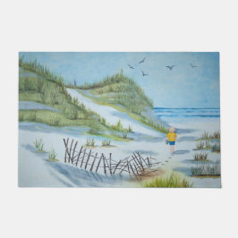 Jongen die het strand rondlopen deurmat