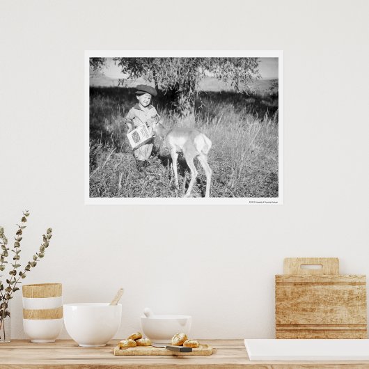 Jongen die met de hand antilopen poster (Keuken)