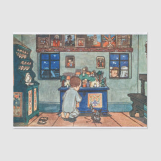  jongen die met kerstspeelgoed speelt tissuepapier