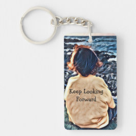 Jongen die naar de oceaan kijken sleutelhanger