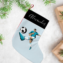 Jongen die voetballen schoppen balspeler coach naa kleine kerstsok