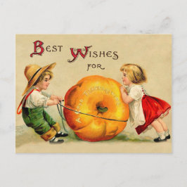 Jongen en meisje met grote Thanksgiving pompoen Briefkaart