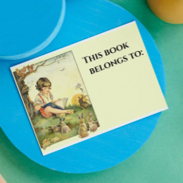 Jongen lezen onder boom met konijnen rechthoekige sticker