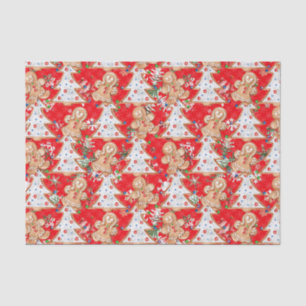 Jongen, meisje met kerstboom op rood tissuepapier