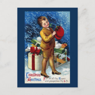 Jongen met een stapel Cadeaus in de sneeuw Briefkaart