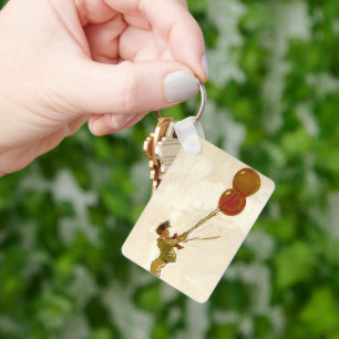 jongen met rode ballonnen op een feest sleutelhanger