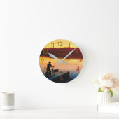 Jongen op fiets bij zonsondergang wandklok (Huis)