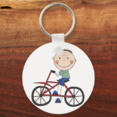Jongen op fietspatjes en cadeautjes sleutelhanger (Voorkant)