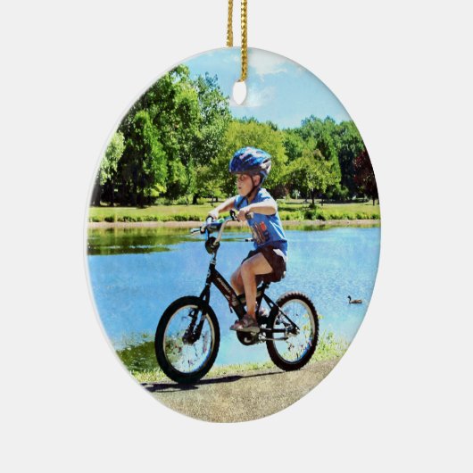 Jongen op zijn fiets keramisch ornament (Rechts)