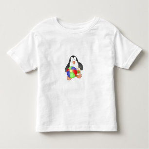 Jongen pinguïn bij de strand kinder shirts