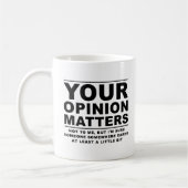 Jouw mening (niet) doet er schamel toe. koffiemok (Links)