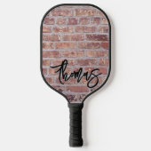 Jouw naam als graffiti op een rode bakstenen muur pickleball paddle (Voorkant)