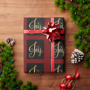 "Joy" Black Red Gold Script Elegant Holiday Cadeaupapier