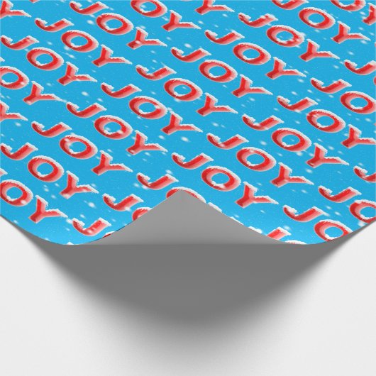 JOY-tekst met sneeuwvlokken op de achtergrond van  Cadeaupapier (Hoek)