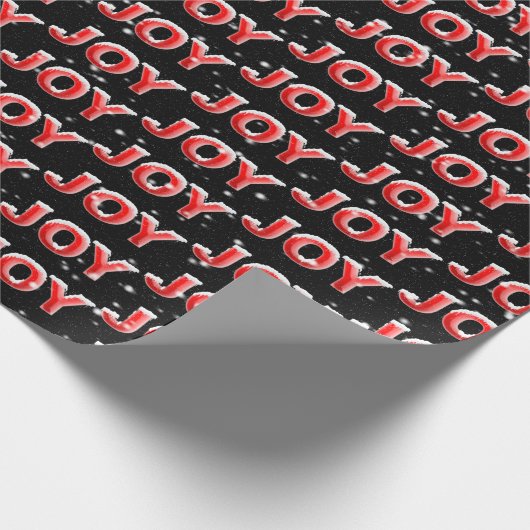 JOY-tekst met sneeuwvlokken op zwarte achtergrond Cadeaupapier (Hoek)
