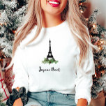 Joyeux Noel Franse Kerstmis met Eiffeltoren T-shirt<br><div class="desc">Dit stijlvolle vakantie shirt zegt "Joyeux Noël" in de Franse moderne typografie,  en heeft een afbeelding van de Eiffeltoren omgeven door dennentakken en dennenappels voor een extra kersttintje. We hebben wat kunst van LABFcreations gebruikt.</div>