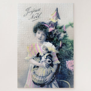 Joyeux Noël met meisje en pop Legpuzzel