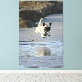 Joyful Pug Leaping by the Ocean Canvas Afdruk (Insitu (Houten vloer))