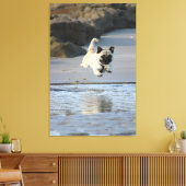 Joyful Pug Leaping by the Ocean Canvas Afdruk (Insitu (Woonkamer))