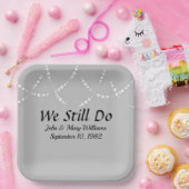 Jubilea lichten op zilver papieren bordje (Feest)