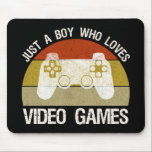 Just A Boy Who Loves Video Games Muismat<br><div class="desc">Just A Boy Who Loves Video Games. This funny gamer accessory is a great gift for a man, boy, teens & kids who love playing video games & computer games. If you're a geek and love console games & computer gaming, this design is for you! Includes a graphic of a...</div>