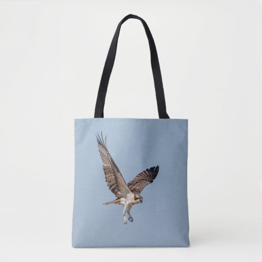 Juvenile Osprey tijdens de vlucht Tote Bag (Voorkant)