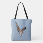 Juvenile Osprey tijdens de vlucht Tote Bag (Achterkant)
