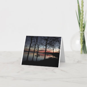 kaart met foto van zonsopgang over een meer