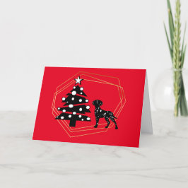 Kaart met zwarte en witte dalmatische en kerstbome