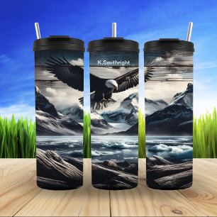 Kale adelaar boven bevroren toppen thermosbeker