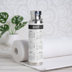 Kalender 2025 op witte berk waterfles