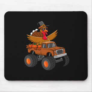Kalkuun met Kerstmis rijdt op een monstertruck Muismat