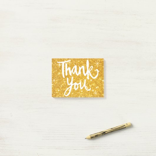 Kalligrafie Bedankt script op Gold Glitter Look Post-it® Notes (Op bureau)