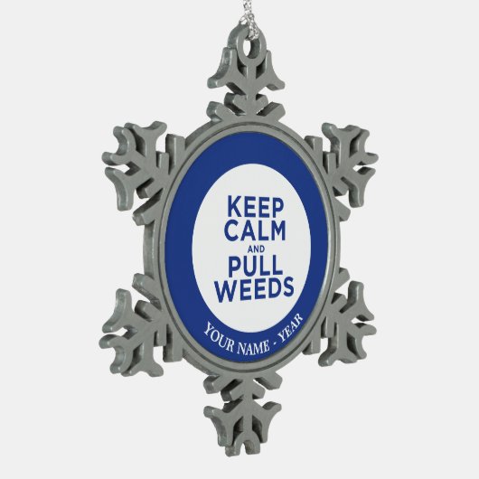 Kalm- en saakkwalsen houden tin sneeuwvlok ornament (Links)