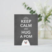 Kalm houden en een pom-pommern vasthouden briefkaart (Staand voorkant)