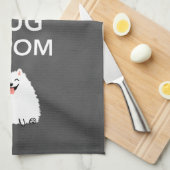 Kalm houden en een pom-pommern vasthouden theedoek (Quarter Fold)