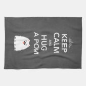 Kalm houden en een pom-pommern vasthouden theedoek (Horizontaal)