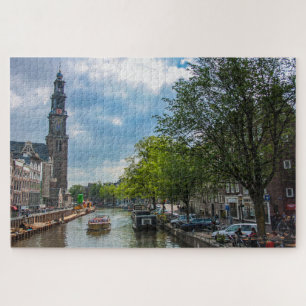 Kanaal en oude kerk in Amsterdam, Nederland Legpuzzel
