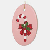 Kandijriet met een zwoerd en kersthals op roze keramisch ornament (Links)