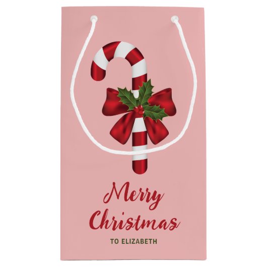 Kandijriet met een zwoerd en kersthals op roze klein cadeauzakje (Achterkant)