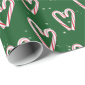 Kandijrietharten en sneeuwvlokken op groen cadeaupapier (Rol Hoek)